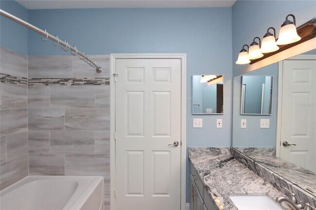 Building Photo - 9088 Lake Chase Island Way
