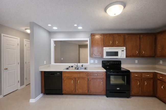 Building Photo - Welcome Home to Comfort, Space & Charm!