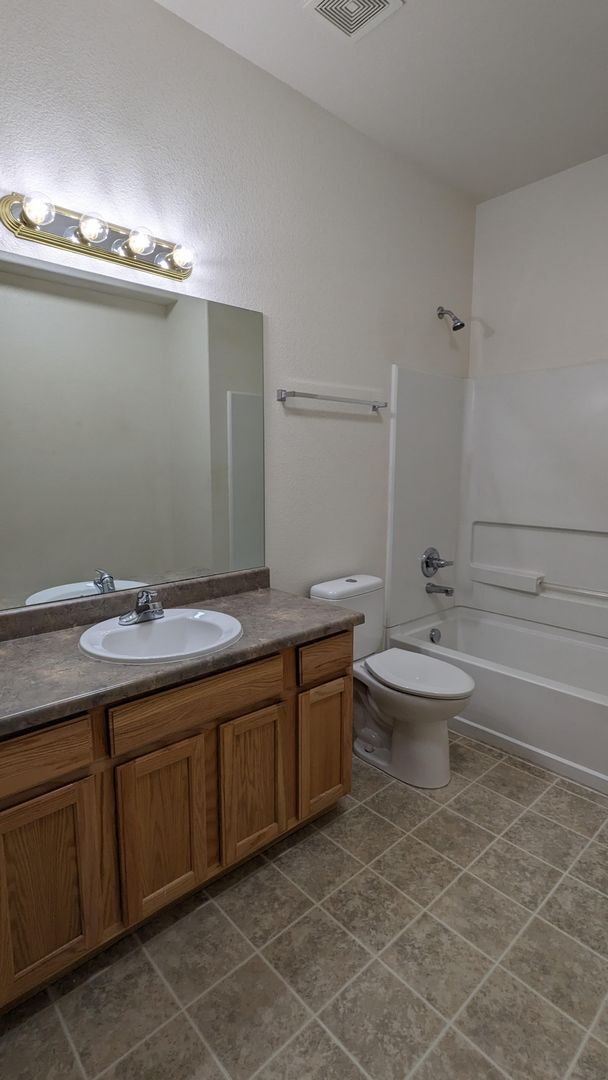 Building Photo - RANCH 3 BED/2.75 BATH PATIO HOME WITH MAIN FLOOR MASTER, FINISHED BASEMENT, AC, 2 CAR GARAGE!