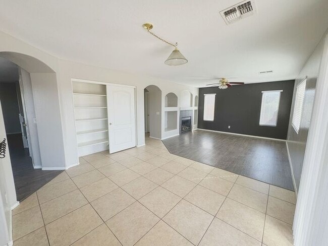 Building Photo - 4BR / 2.5BA Home with Expansive Lot – 2-Car Garage, Community Pools & Golf