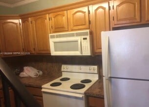 Building Photo - 8009 W 6th Ave