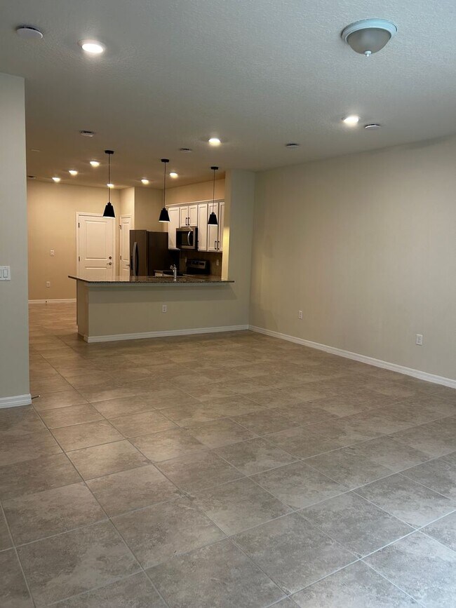 Building Photo - Move In ASAP!! - Brand New 3 bedroom 2.5 bath Townhouse for rent in Kissimmee, FL.
