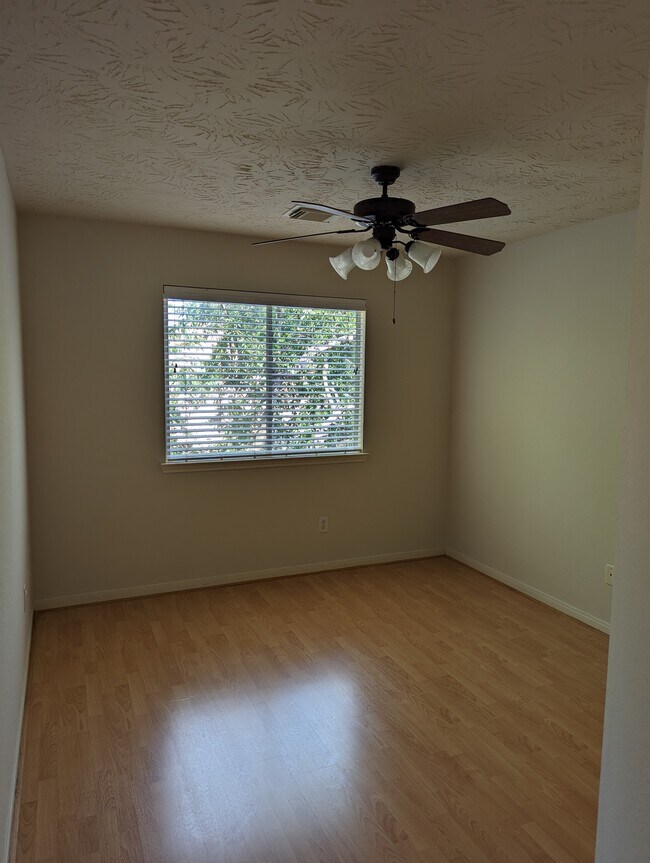 1 of 2 bedrooms, situated in between the full bathroom. - 5910 Hollister Cole