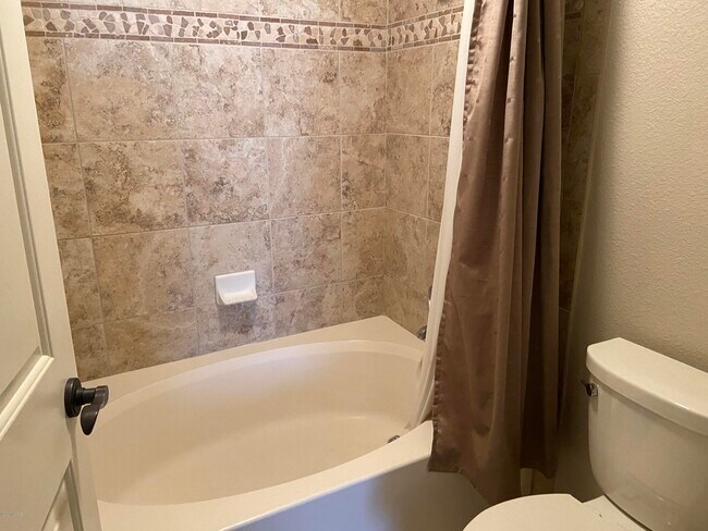 Building Photo - 7050 E Sunrise Dr