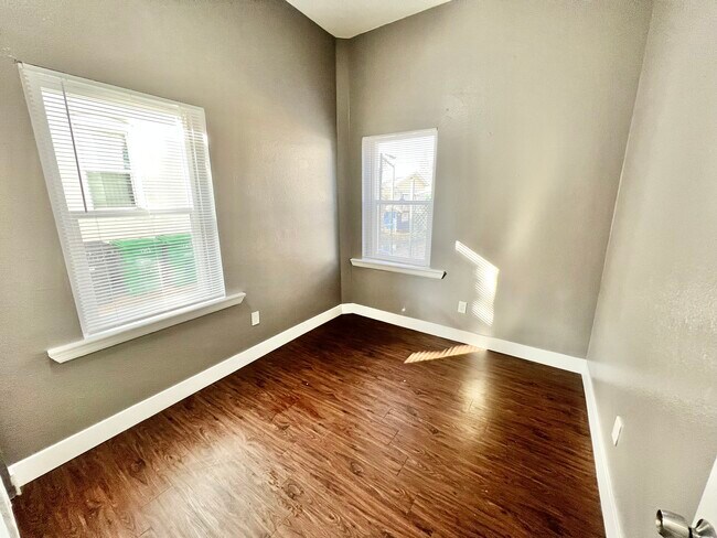 Embrace the charm of this sunlit cozy room, perfect for personalized decor. - Williams Street