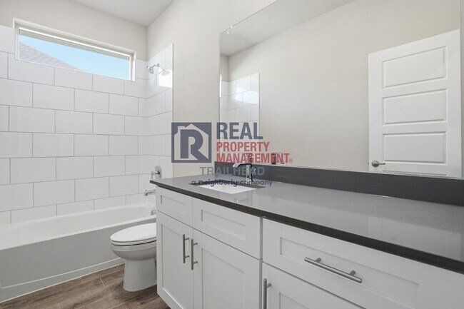 Building Photo - Stylish Open-Concept 4-Bedroom Home with Smart Interior Flow