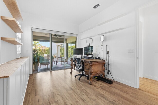 Building Photo - Luxury 5-Bedroom Residence in Eagle Creek with Indoor-Outdoor Living