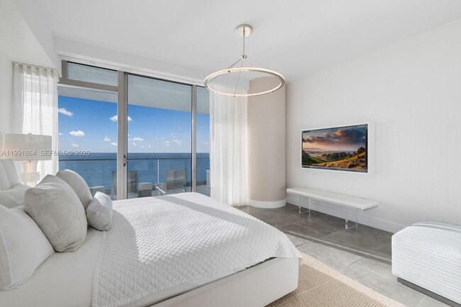 Building Photo - 10203 Collins Ave