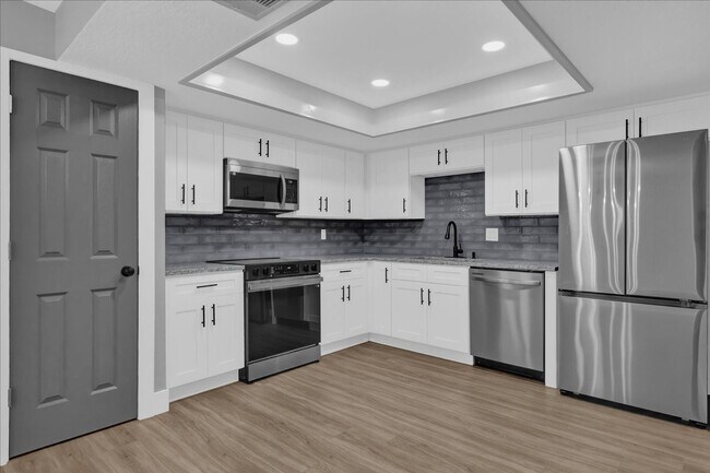 Building Photo - FOR RENT!! SIMPLY STUNNING 4 BED 2 BATH PO...