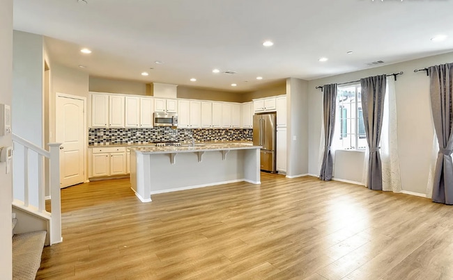 Building Photo - This gorgeous 3-bedroom, 3.5 bath townhome...
