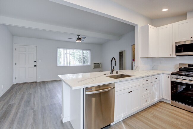 Building Photo - West 11th Avenue Apartment Homes