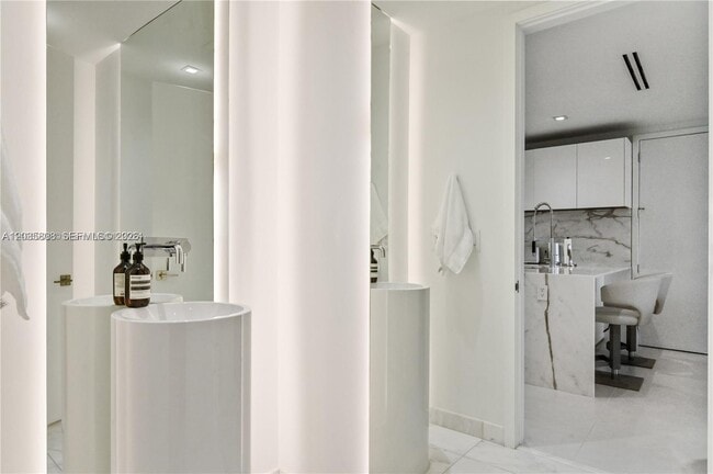 Building Photo - 10203 Collins Ave
