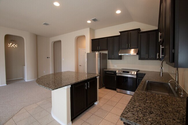 Building Photo - TWO WEEKS FREE RENT!!!  Welcome to this charming 3-bedroom, 2-bathroom home located in the vibran...