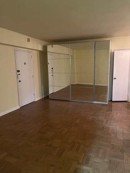 mirrored armoire + entry door - 2500 Q St NW