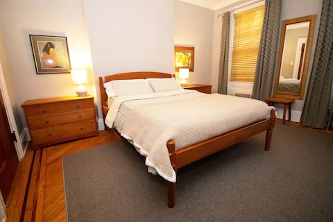 queen bed with natural fiber linens - 18 Schermerhorn St