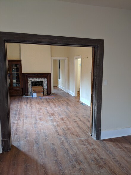looking from bedroom to livingroom, pocket doors open - 214 Peebles Street