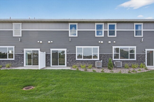 Building Photo - Westview townhome plan in Corcoran’s Hope Meadows community—a brand-new townhome development near...