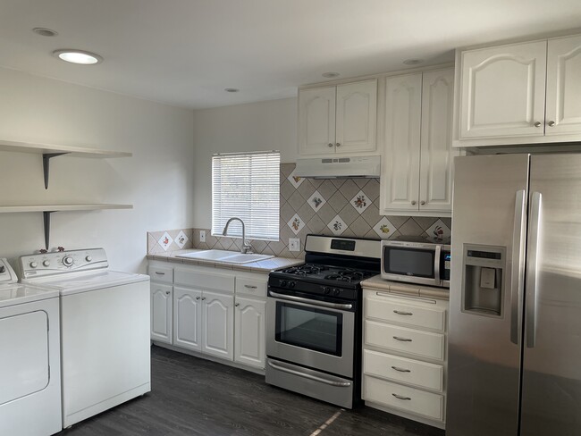 Kitchen and laundry area - 766 Temple Ave