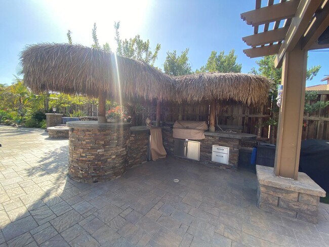 Building Photo - Spacious 5-Bedroom Luxury Home with Entertainer’s Backyard Oasis