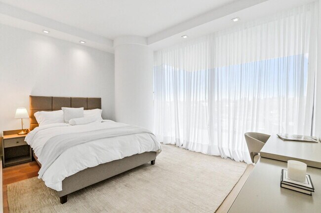 Building Photo - 10203 Collins Ave