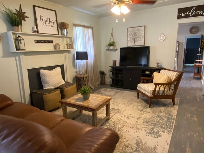 Building Photo - Partially Furnished Charming 4 Bedroom hom...