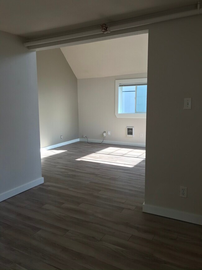Living room looking toward dining room - 916 Martin Luther King Jr Way S.