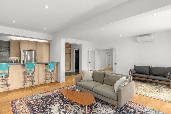Building Photo - Stunning remodeled apartment with large walk-out patio