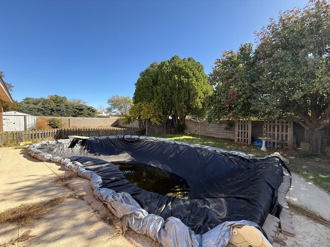 Building Photo - 4 Bed Brick Home! Zia School District! - P...