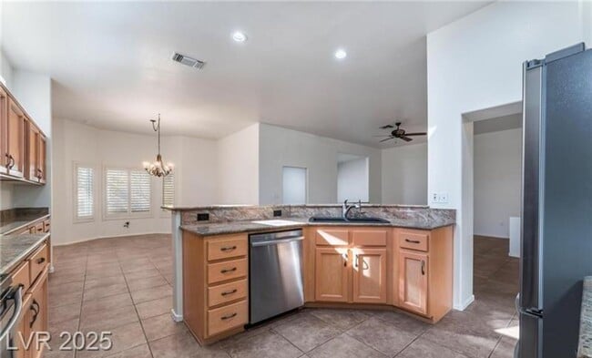 Building Photo - Darling home in Sun City Summerlin featuring 2 bedrooms plus a den!