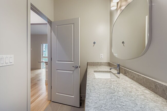 Building Photo - Swanky 1BR – New, Private Garage, Storage,...