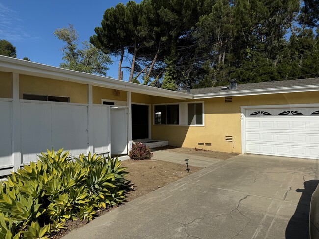 2-car garage available to use with extra fridge - 679 Rancho Dr