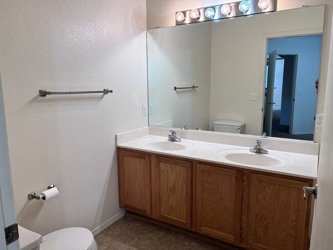 Building Photo - Wonderful 3 Br condo in gated community with the major appliances and 1 car garage.