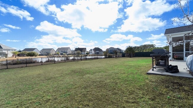 Building Photo - Elegant Richmond Hill Home with Screened Patio & Lagoon Views