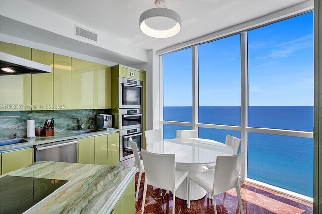 Building Photo - 18201 Collins Ave