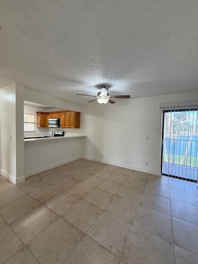 Building Photo - Updated 2BR/2BA w/ Balcony — Palm Beach Grande