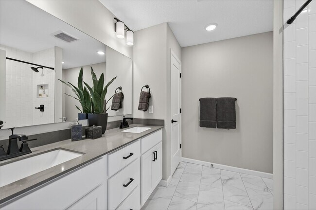 Building Photo - Westview townhome plan in Corcoran’s Hope Meadows community—a brand-new townhome development near...