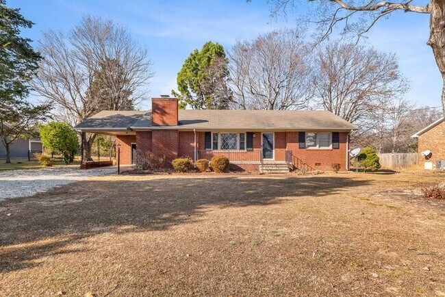 Building Photo - Elon - Large Brick Home, Hardwoods, Granite Counter-Tops, SS Appliances, Fire Place, Carport - Mu...