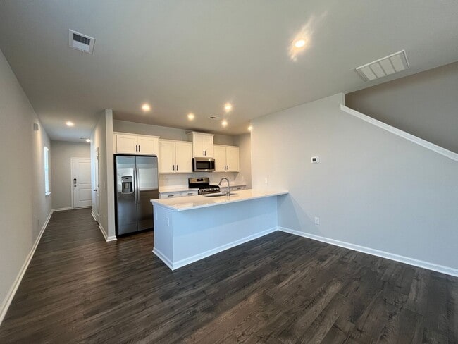 Building Photo - New 4/3 Townhome Available Now