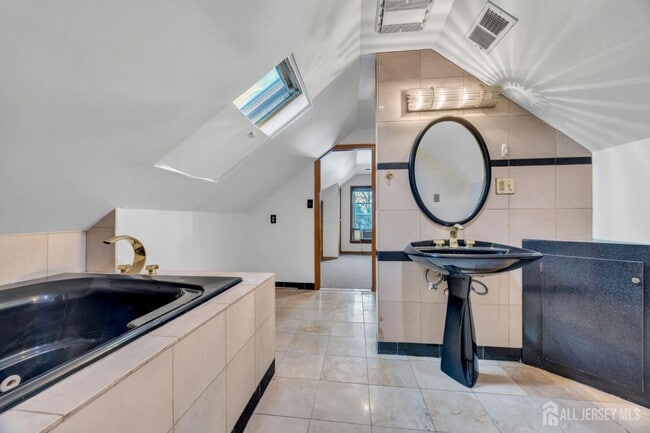 Building Photo - 128 E Colfax Ave