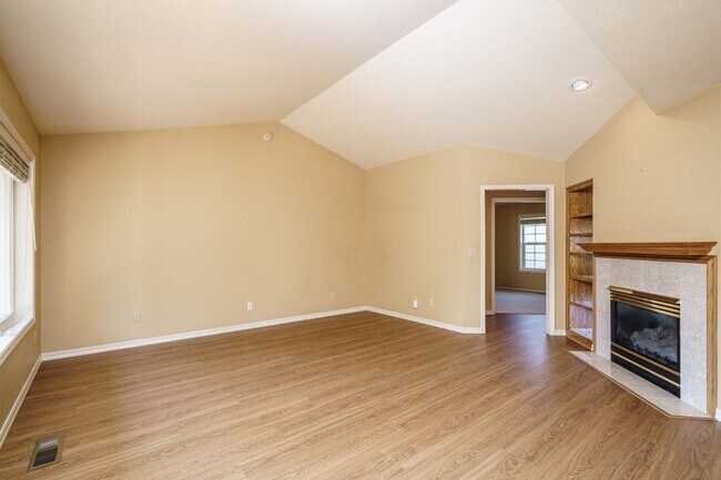 Building Photo - Beautifully Landscaped 1/4 acre with Well Maintained 4 bedroom 2 Bath Home with 3 Car Garage
