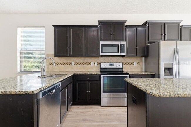 Building Photo - 9004 Mountain Magnolia Dr