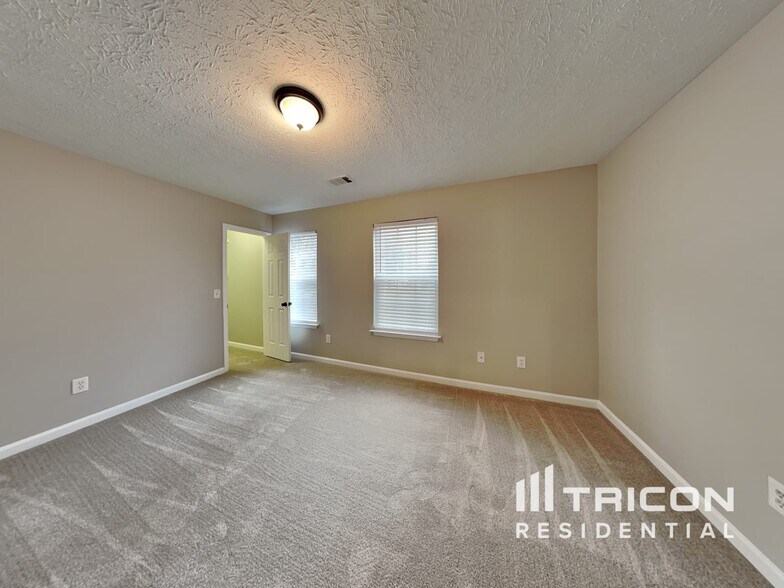 Building Photo - 8665 River Rock Ct