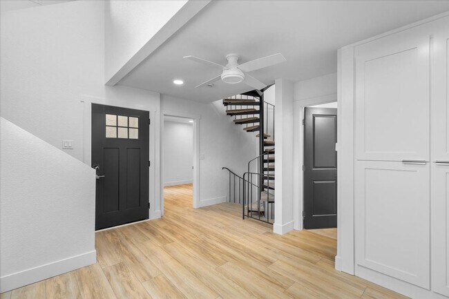 Building Photo - COMPLETELY REMODELED, BRIGHT & AIRY, TRI-LEVEL HOME W/ TOP-FLOOR GREAT ROOM LIVING SPACE, 2-CAR G...