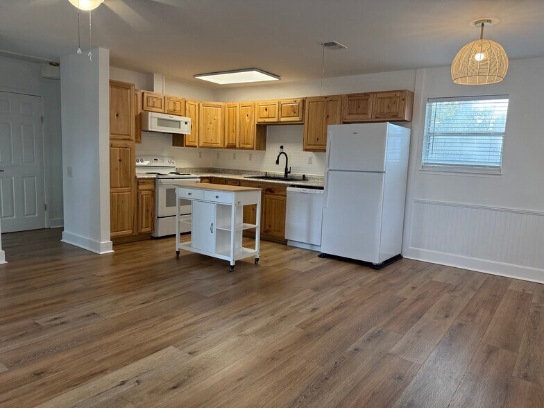 Kitchen + dining area - 235 Waterside Ln