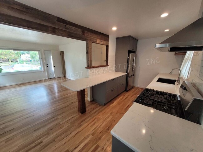 Building Photo - Beautiful 3 bdrm Home w/ a remodeled kitchen, stainless appliances, deck, yard and more!!!
