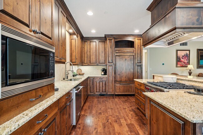 Building Photo - 2 Creeks Condominiums - Gated Community on...