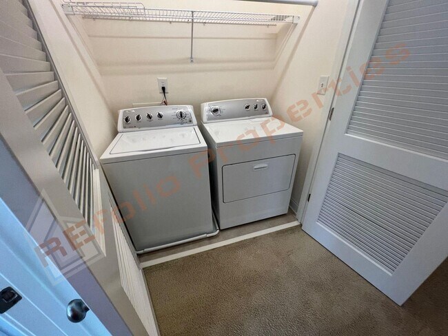 Building Photo - Elegant 3 Story 3 Bedroom Formal Model Tow...