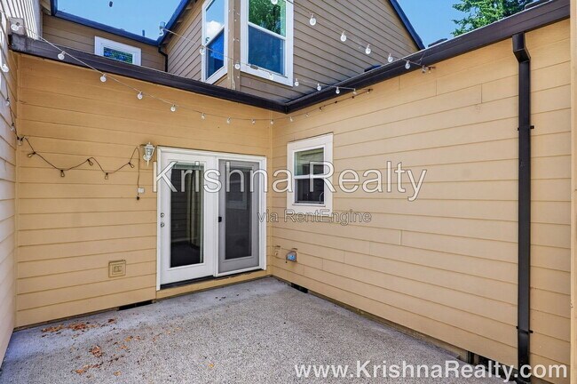 Building Photo - 8165 NE Wilkins St
