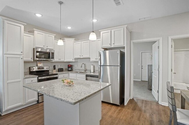 Building Photo - Modern 3/3 Condos with Private Baths & Lux...