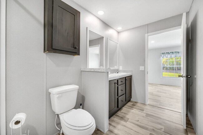 Building Photo - Experience exceptional living at its finest
